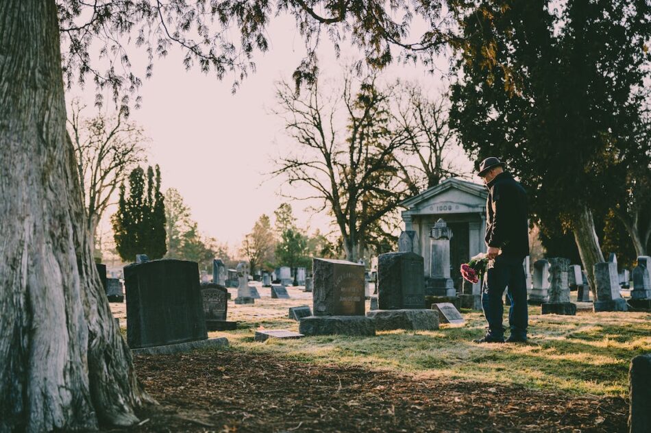 A man at a graveyard