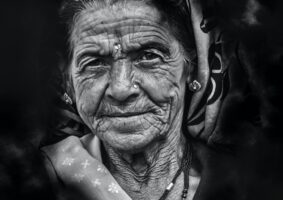 An elderly woman beaming with hope- India